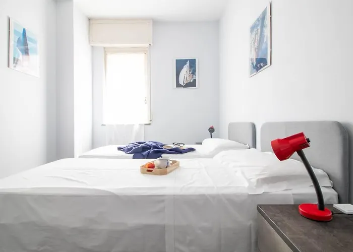 Апартаменты Appartamento-raffaello House-affitti Brevi Italia Рива-Тригозо