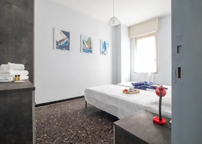 Appartamento-raffaello House-affitti Brevi Italia * Рива-Тригозо