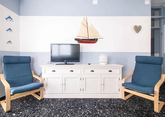 Апартаменты Appartamento-raffaello House-affitti Brevi Italia Рива-Тригозо